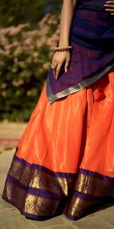 Peaceful Orange Color Kanchipuram Zari Weaving Lehenga Choli