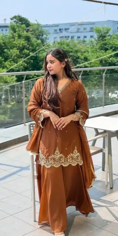 Amazing Rust Color Georgette Sequence Moti Work Salwar Suit